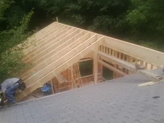 Framing a new roof addition that ties into an existing shingle roof in Schaghticoke